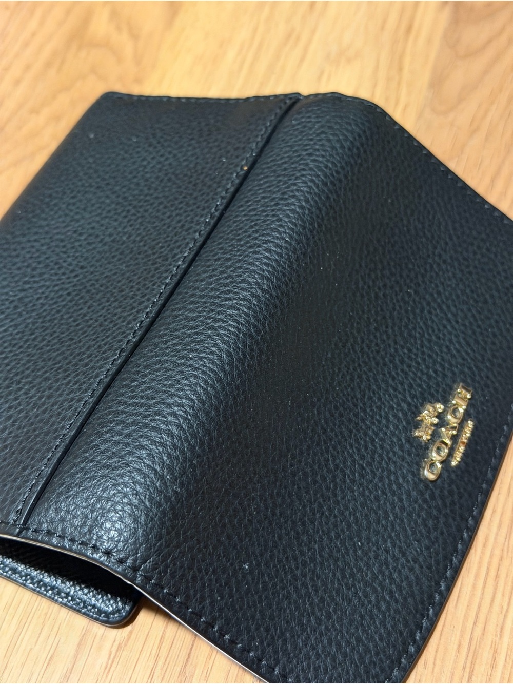 Coach Black Pebbled Leather Bifold Wallet with Gold Logo